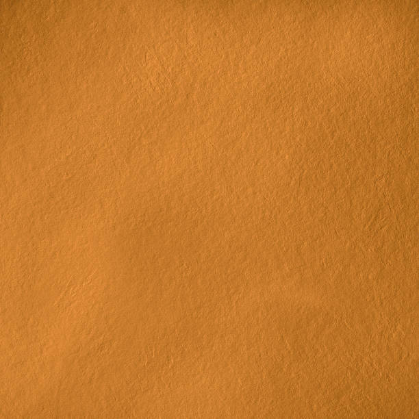 istock Texture natural stone golden color. Background natural relief stone. Square size. 1136419812