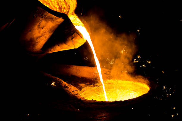 istock metal casting process with red high temperature fire in metal part factory 1136421426