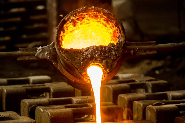 istock metal casting process with red high temperature fire in metal part factory 1136421433