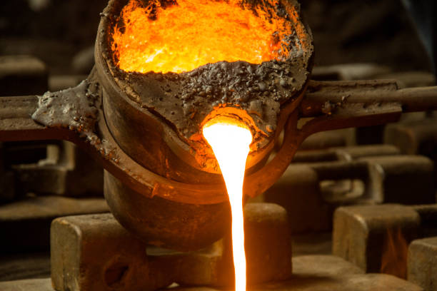 istock metal casting process with red high temperature fire in metal part factory 1136421434
