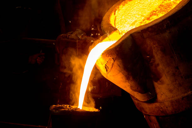 istock metal casting process with red high temperature fire in metal part factory 1136421437
