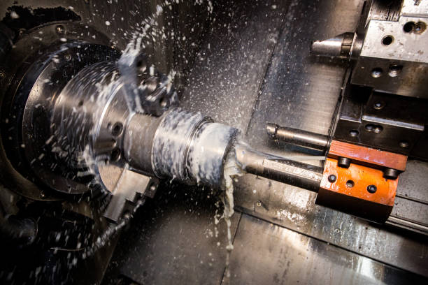 istock Close up of CNC machine at work 1136421510