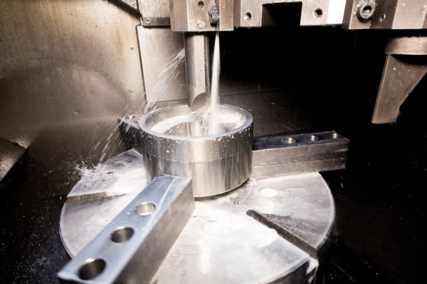 istock Close up of CNC machine at work 1136421520