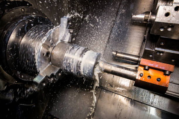 istock Close up of CNC machine at work 1136421551