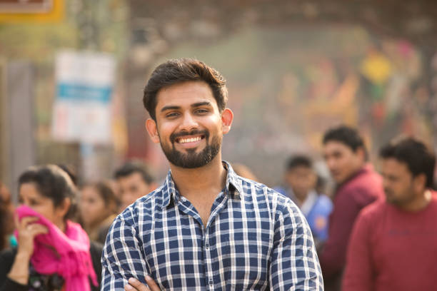 istock Young man at street market 1136422512