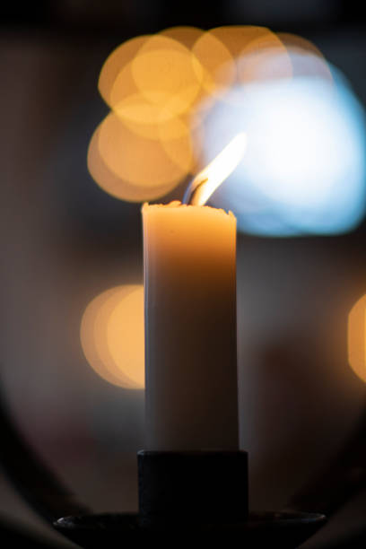 istock Candles light burning in a Scandinavia church, closeup 1136424131
