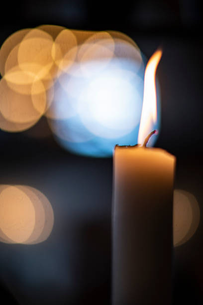 istock Candles light burning in a Scandinavia church, closeup 1136424168