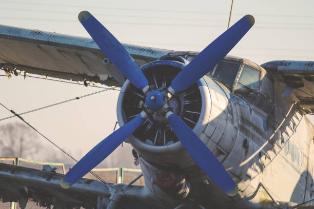 istock old destroyed rusting biplane in an open-air cemetery, retro toned 1136425992