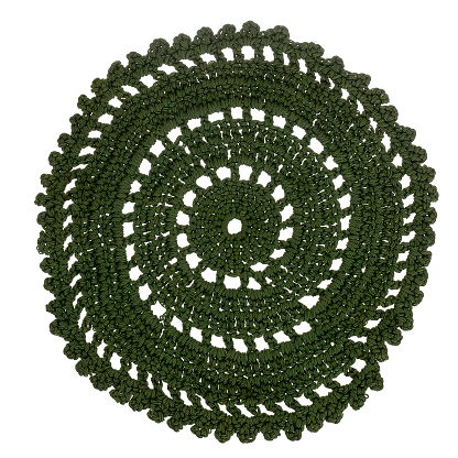 Vintage green crochet circle, round doily, isolated on white background. Handmade craft.