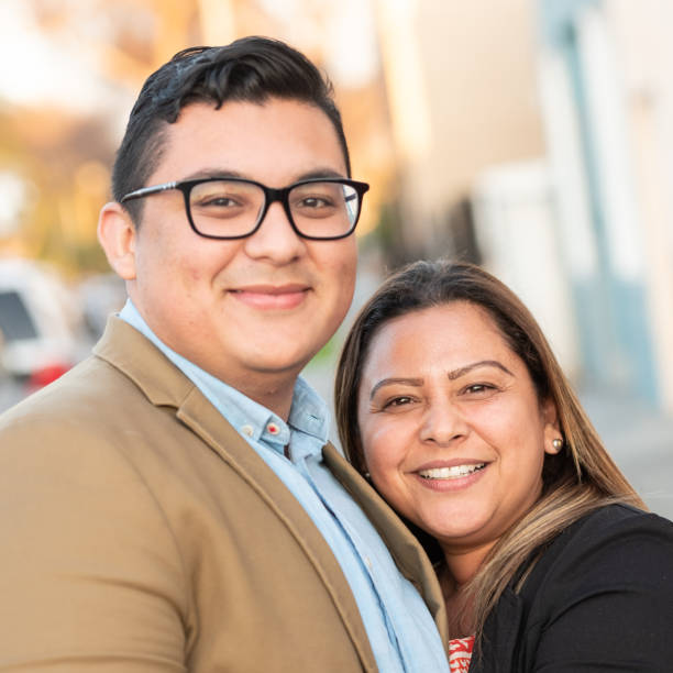 istock Mature hispanic woman posing with her son 1136429016
