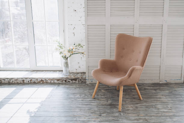 istock Vintage chair on the background of panoramic windows 1136429347