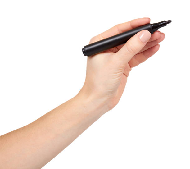 istock Hand with felt tip marker, drawing or writinng gesture. 1136433320