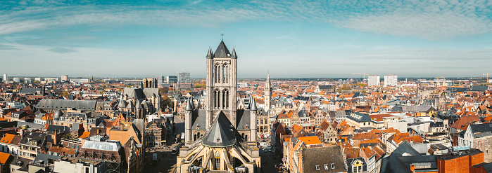 Aerial panoramic view of the historic city of Ghent on a beautiful sunny day with blue sky and clouds in summer, province of East Flanders, Belgium