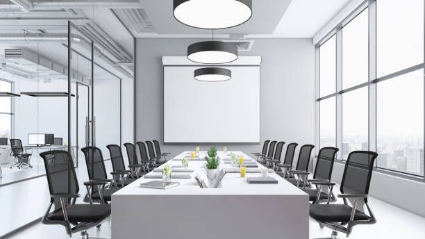 istock Contemporary conference room interior with large blank projection screen 1136436808