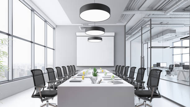 istock Contemporary conference room interior with large blank projection screen 1136436816