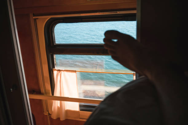 istock sea behind the train window. travel. vacations. 1136439989