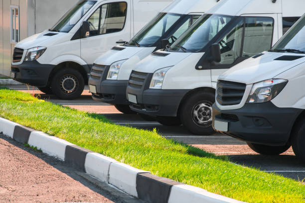 istock delivery trucks, vans parking 1136439997