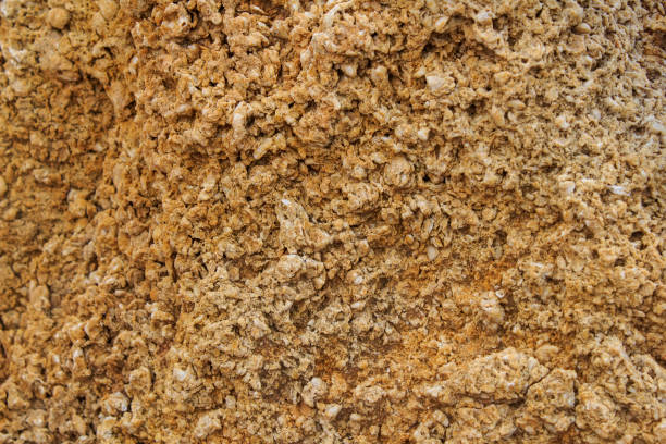istock Rock, layeres structure, warm brown, yellow, red shades. 1136443514