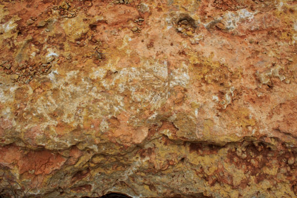 istock Rock, layeres structure, warm brown, yellow, red shades. 1136443553