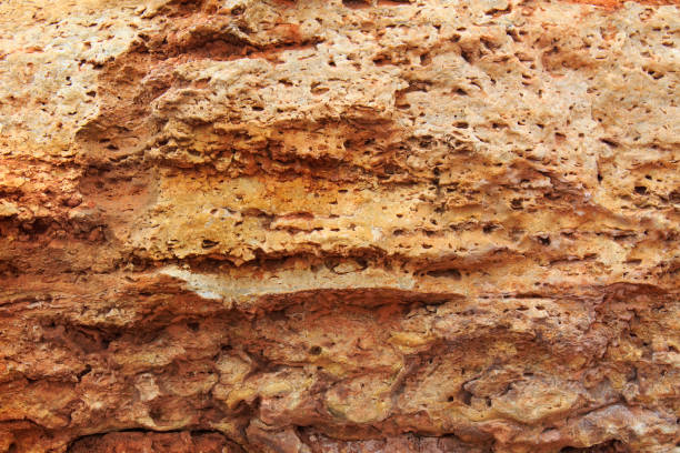 istock Rock, layeres structure, warm brown, yellow, red shades. 1136443781