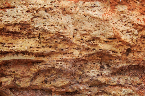 istock Rock, layeres structure, warm brown, yellow, red shades. 1136444127
