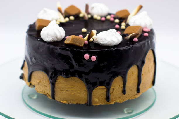 istock homemade chocolate cake with marshmallow, caramel, sugar 1136446127