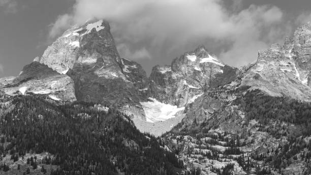 istock Snowcapped Grand Teton Mountains Wilderness Glacier Black and White 1136447954