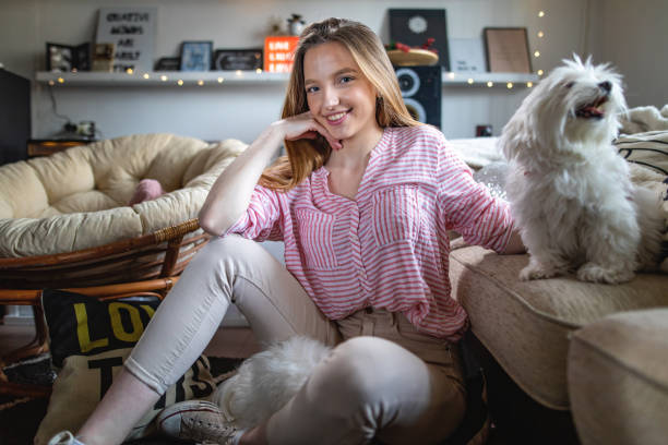 istock Beautiful millennial with maltese dogs 1136450699