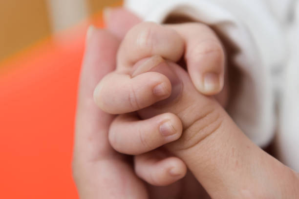 istock Hand of the newborn. 1136450773