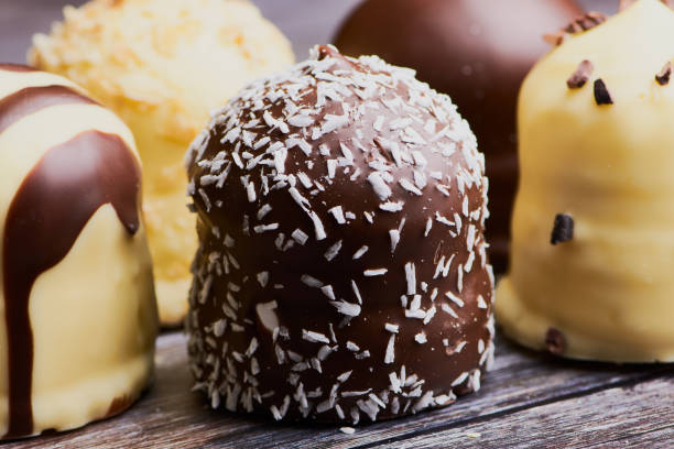 istock close up of white and dark chocolate covered marshmallows 1136451684
