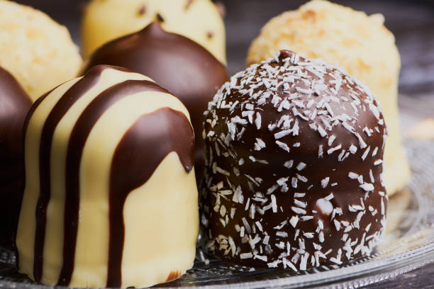 istock close up of white and dark chocolate covered marshmallows 1136451723