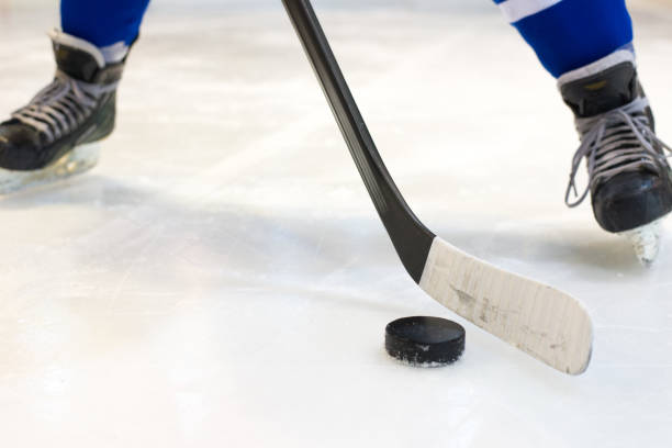 istock Hockey player standing on the ice 1136454657