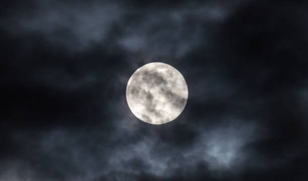 istock Moon through the clouds at night, super moon 1136456756