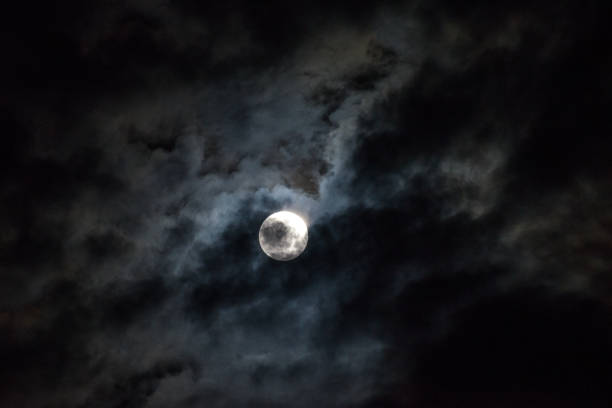 istock Moon through the clouds at night, super moon 1136456760