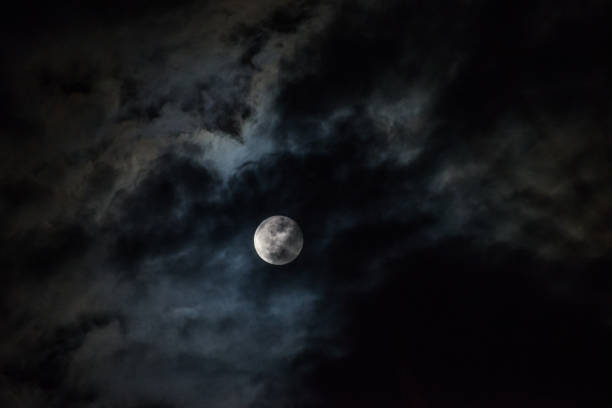 istock Moon through the clouds at night, super moon 1136456761