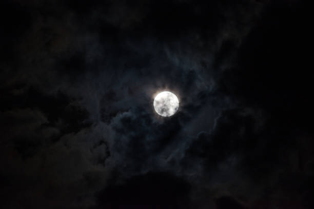 istock Moon through the clouds at night, super moon 1136456773