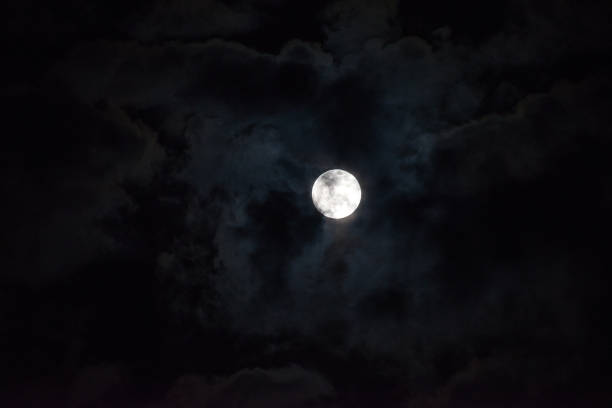 istock Moon through the clouds at night, super moon 1136456782