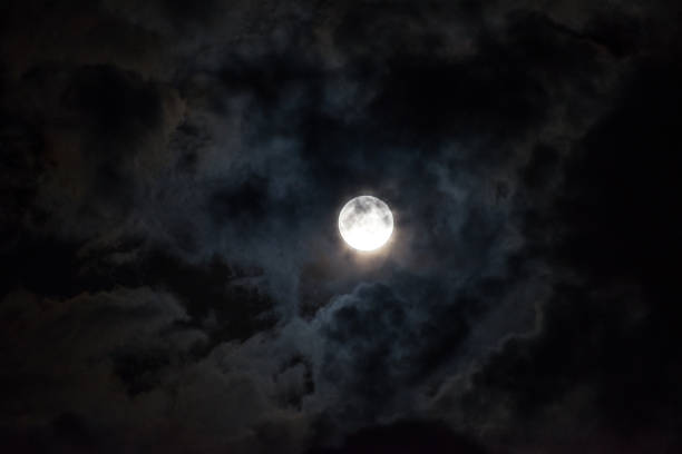 istock Moon through the clouds at night, super moon 1136456797