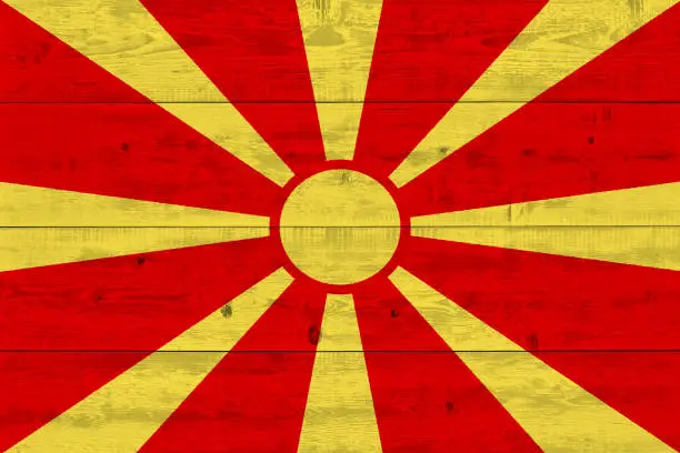 Photo of Macedonia flag painted on old wood plank