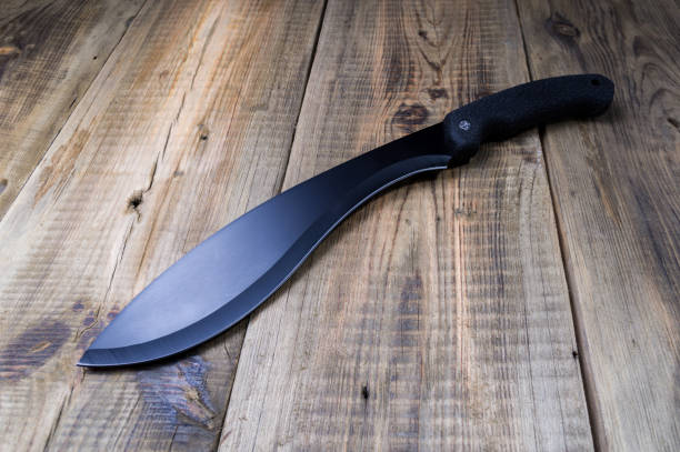 Large knife for work in the forest or field. Agricultural knife. Large knife for work in the forest or field. Agricultural knife. Front view. Machete stock pictures, royalty-free photos & images
