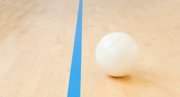 istock White volleyball on the floor in the gym 1136460210