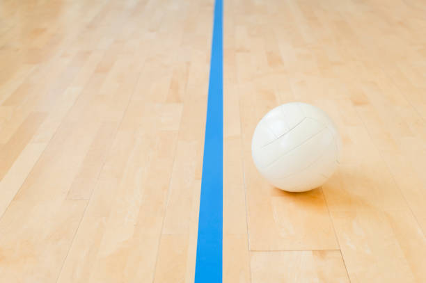 istock White volleyball on the floor in the gym 1136460244