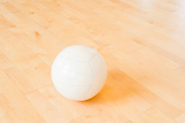 istock White volleyball on the floor in the gym 1136460285