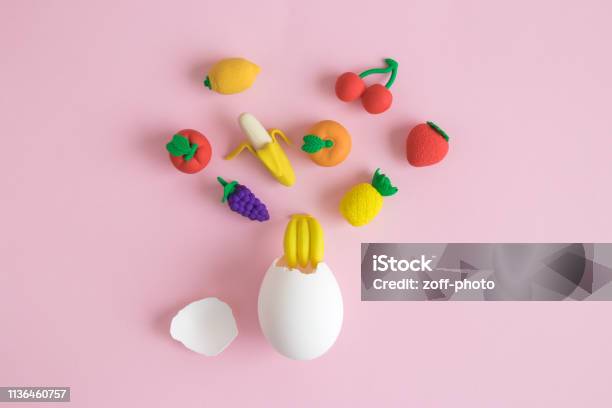 Flat Lay Of White Egg And Fruits Abstract On Pastel Pink Background Stock Photo - Download Image Now