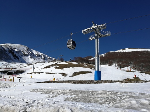 Roccaraso, L'Aquila, Abruzzo, Italy - March 15, 2019: Gondola of the Gravare ski resort, on the Aremogna
