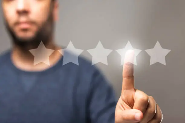 Photo of 5 stars review score, reputation management, rating concept, high quality service