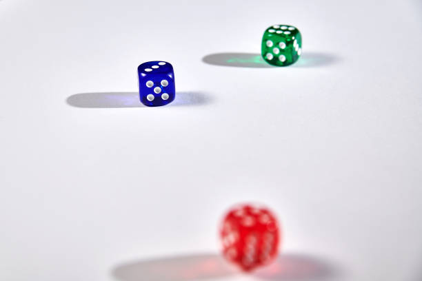 istock colorful dices in motion on white background 1136464679
