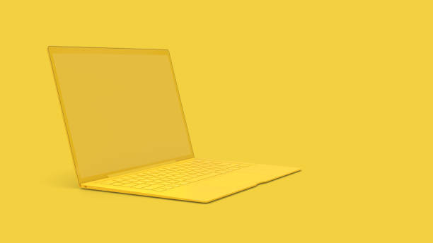 istock Laptop background with blank screen yellow color 1136465912
