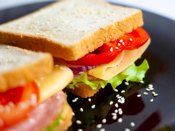 istock sandwiches with cutlet and fresh vegetables, onions, tomatoes, bell peppers, eggs, cheese and green salad 1136465963