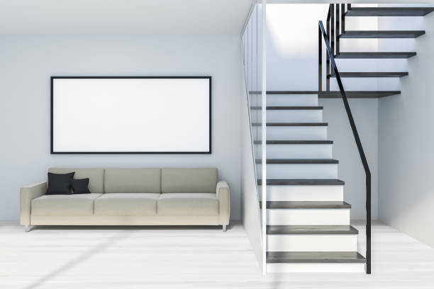 istock White living room with stairs and poster 1136467068